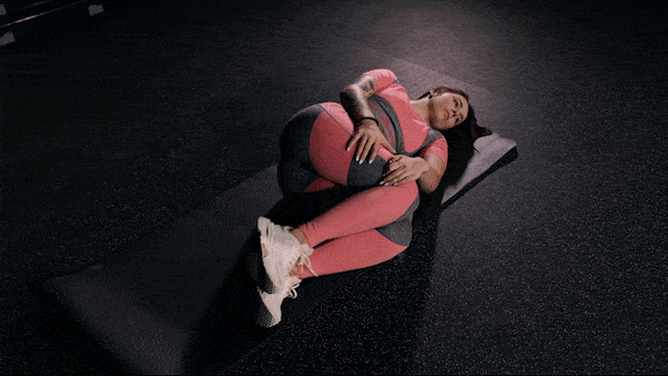 Hoe doe je de pretzel pose om rugpijn te verlichten?