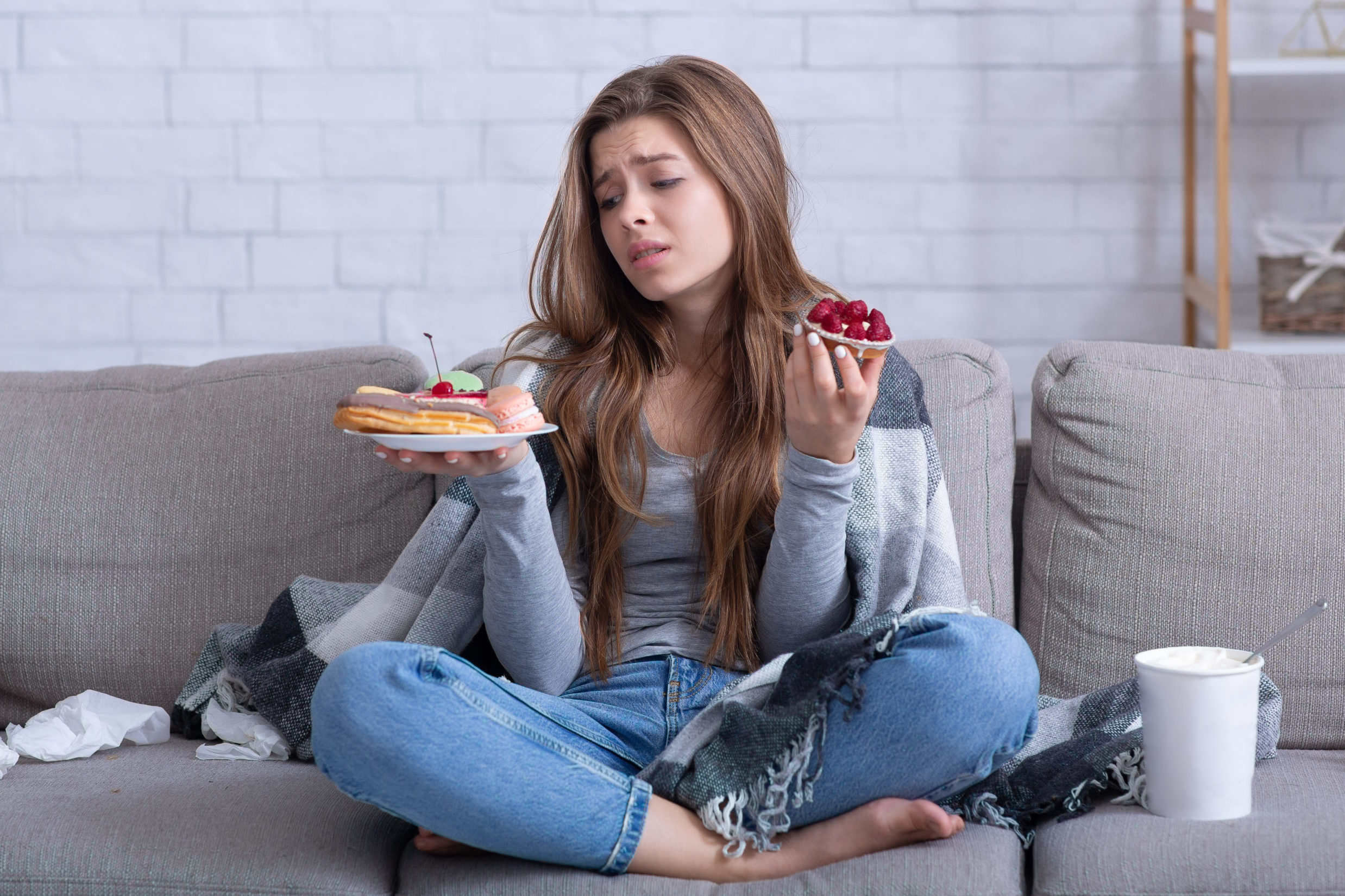 Wat zijn de symptomen van PMS en menstruatie? 