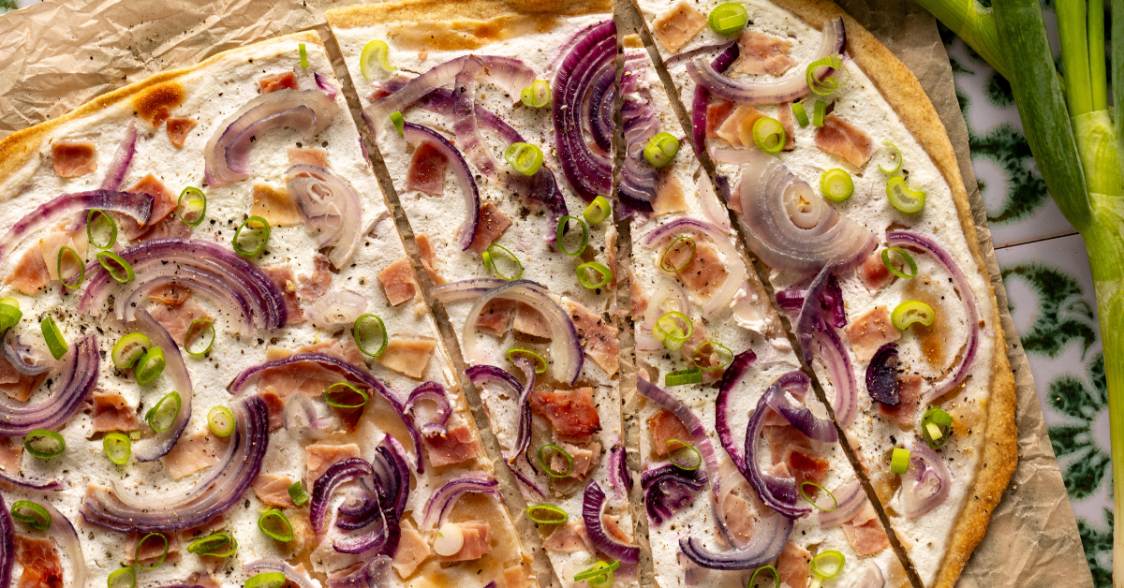 Flammkuchen savoury pie with sour cream and onion