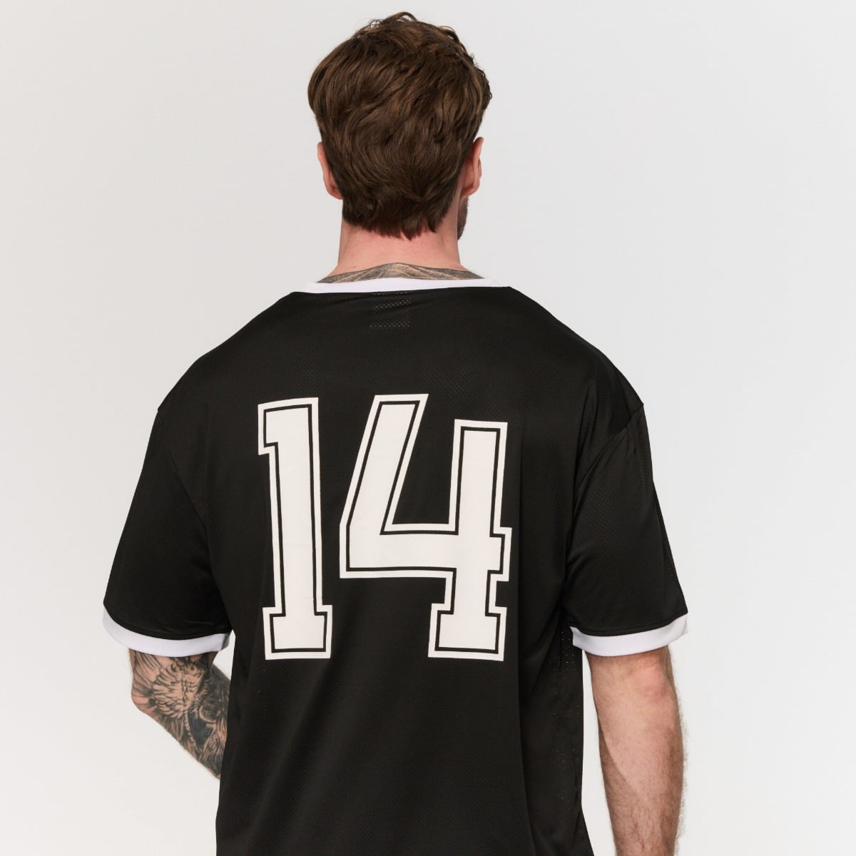 Oversized Varsity Black T-shirt - GymBeam